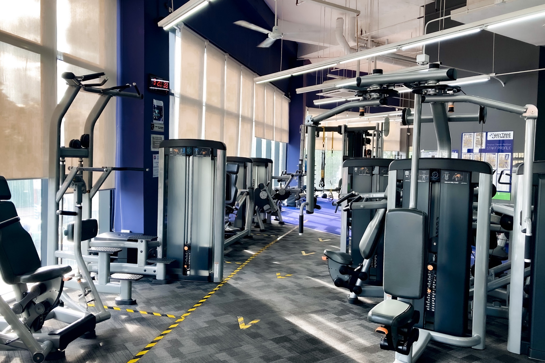 Bright fitness center with exercise machines